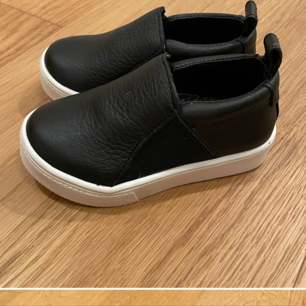 Freshly picked black slip ons